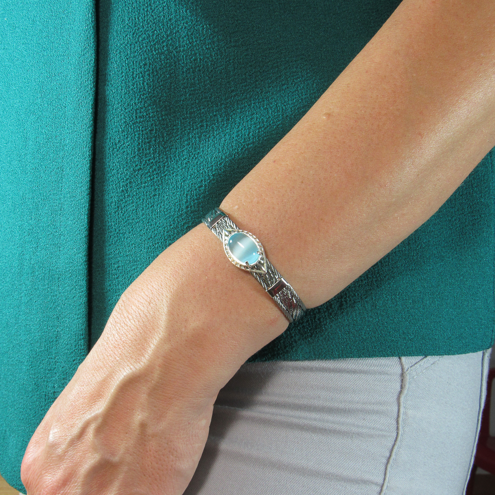 Brazalete cable de Acero figura oval de Plata y Ojo de gato 1
